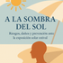 Imagen del libro "A la sombra del sol" de Asoenfermería, con portada que muestra texto y diseño en tonos cálidos.